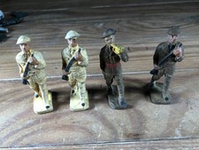 4 VINTAGE PLASTIC OR RUBBER 3" WWI SOLDIERS