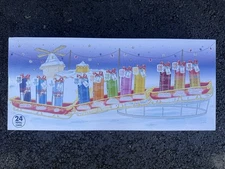 Red Bull ADVENT CALENDAR 2025 24 Cans IN HAND USA Pink Green Amber Yellow Winter