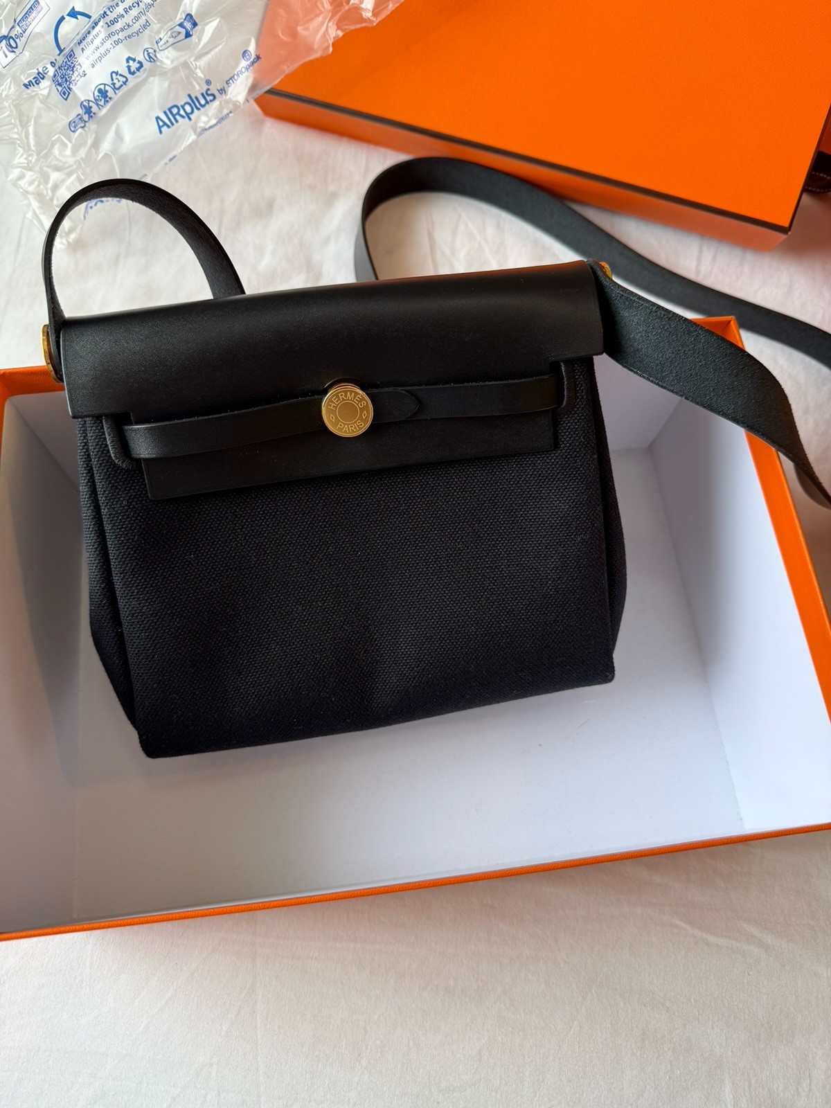 Hermès Herbag Zip 31 in Noir, canvas with black Hunter leather and gold hardware