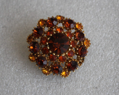 Modeschmuck-Brosche Vintage bernsteinfarbene Strasssteine gemarkt SPHINX
