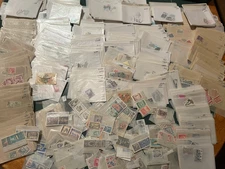 1268 glassines with worldwide stamps, most with Scott numbers,  ex-dealer lot