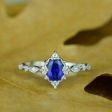 Pretty Oval Cut Simulated Blue Sapphire Engagement Ring In 14k White Gold Plated