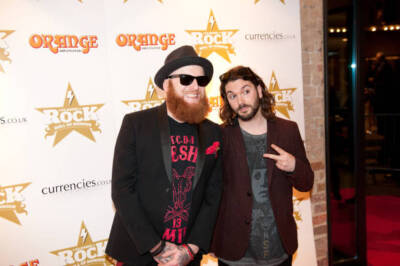 Mikey Demus Araya Goggin of Welsh rock band Skindred attend the C/- Old Photo 1