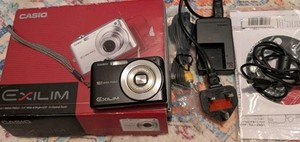 Casio Exilim EXZ1050 10.1MP Digital Camera Box Charger 8gbCard Case Battery Disc