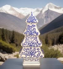Blue and white chinoiserie ceramic Christmas holiday winter tree floral motif 
