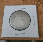 1875 p well circulated (worn) silver seated liberty half dollar