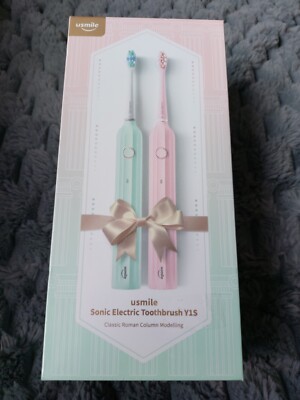 Usmile 2 x Elektrische Schallzahnbürsten Pink / Grün UVP 60 