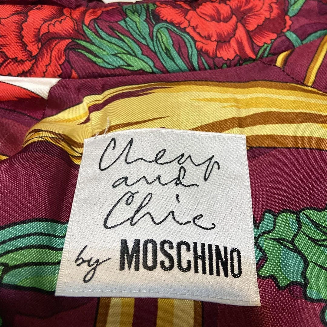 Cappotto lungo Moschino economico e chic fodera sciarpa stampa all over vestito taglia L