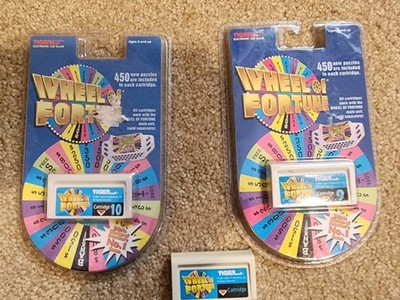 3 Wheel Of Fortune Cartridges  NEW 9 & 10 & another Tiger Electronics LCD Game