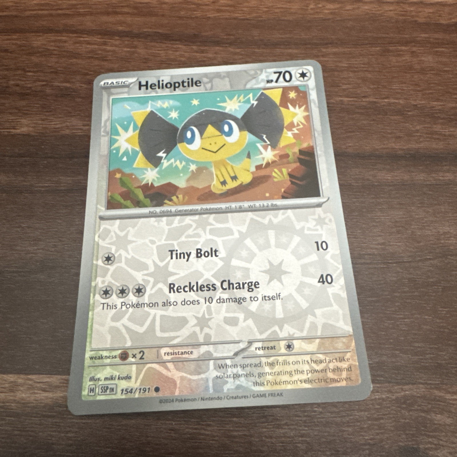 Helioptile 154/191 Pokemon Scarlet Violet Surging Sparks Reverse Holo NM