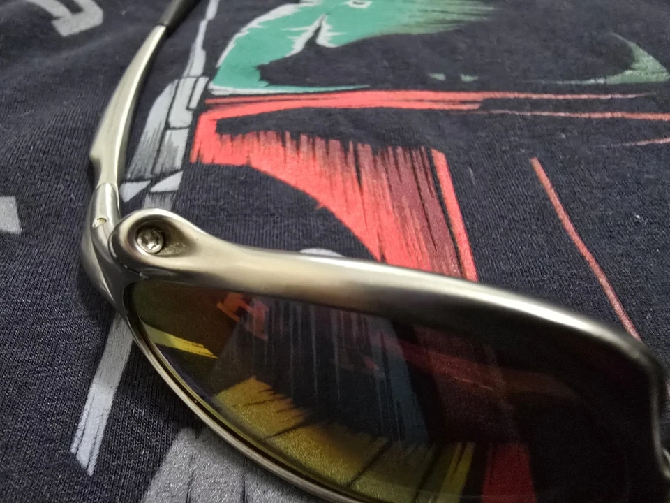 MARCO OAKLEY X-METAL PENNY TITANIO CON RUBÍ IRIDIO SERIALIZADO  Foto 4 de 4