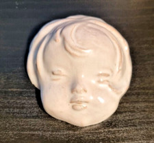 ceramica artistica di Faenza MATTEUCCI e MUKY. Volto di bambina. 