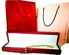 Yellow gold finish red ruby Oyster Range created diamond tennis bracelet 