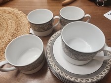 Studio Nova "Courtyard " 4 Tea Cups 3.25 " and 4 Saucers 6 1/8"  Lot Of 4