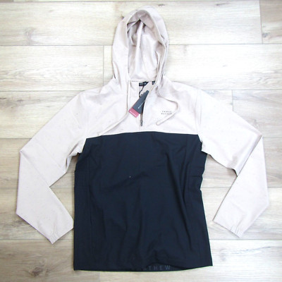 NEW 2025 TRAVIS MATHEW MENS ROCKY SHORE HEATER GOLF 1/4 ZIP HOODIE JACKET TAN