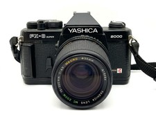 Yashica FX-3 Super 2000 + Yashica 75-200 mm f/4.5 kit set fotocamera reflex analogica 35 mm