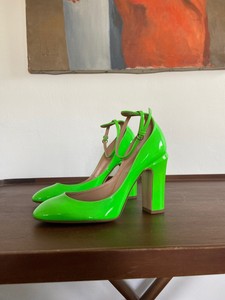green patent leather pumps