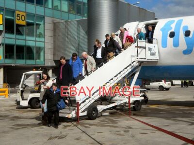 PHOTO  DISEMBARKING AT TERMINAL 3 PASSENGERS LEAVE A FLYBE FLIGHT FROM JERSEY TO