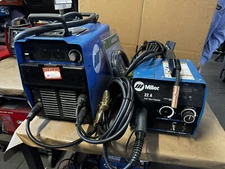 Miller XMT 304 CCCV WITH 22A Wire Feeder Completer Flowmeter Cables Clamp Hose