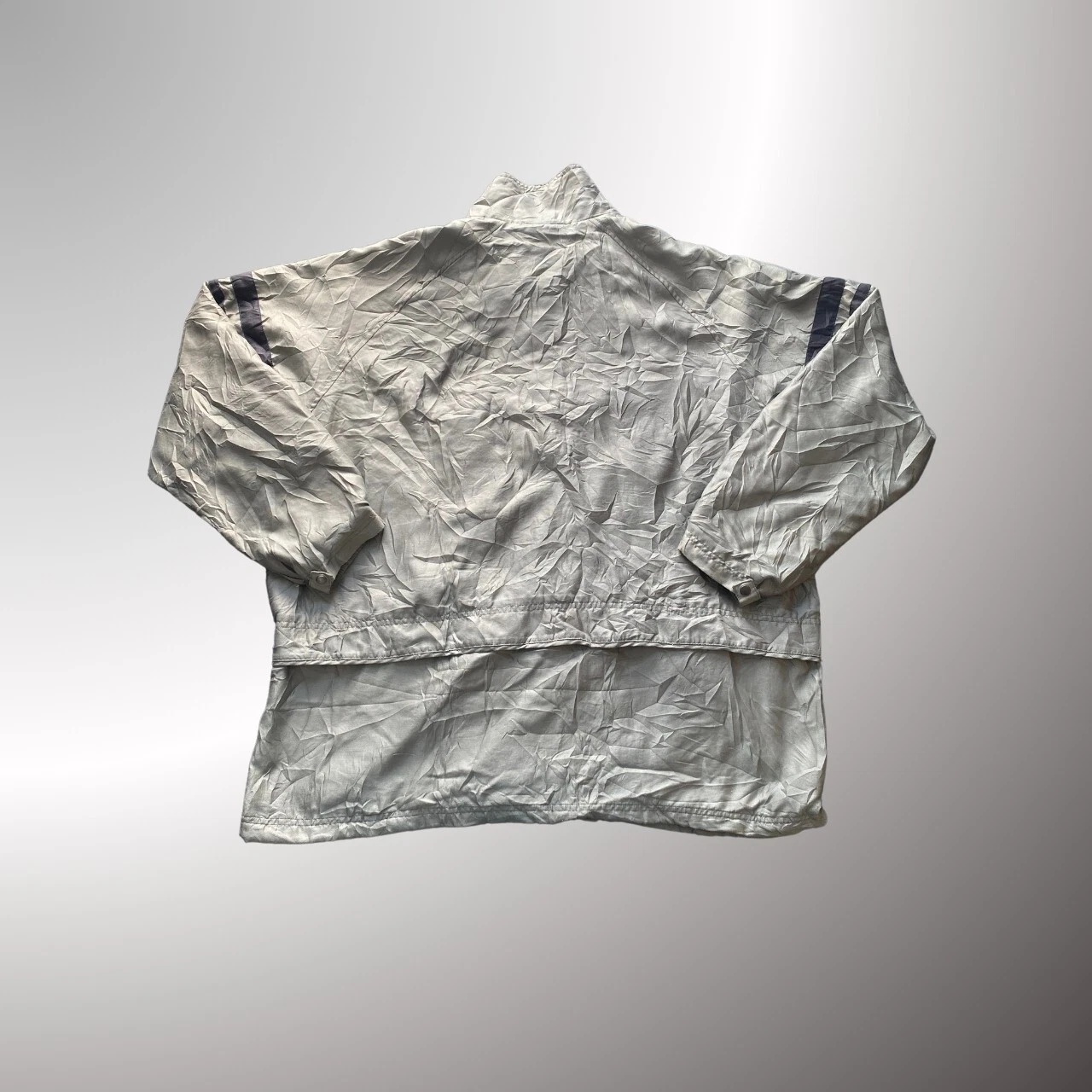 Vintage Nike windbreaker jacket with a unique crinkled silver-gray fabric
