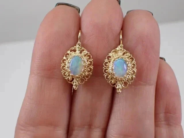 Pendientes colgantes vintage de ópalo de fuego natural de 3 quilates de corte ovalado enchapados en oro amarillo de 14 quilates Foto 2 de 4