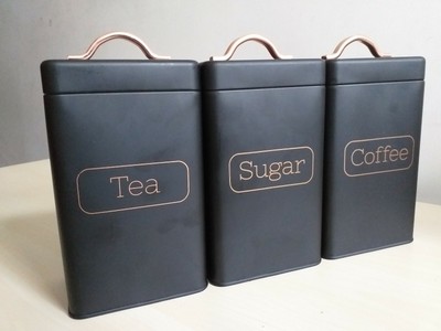 black and rose gold tea and coffee canisters