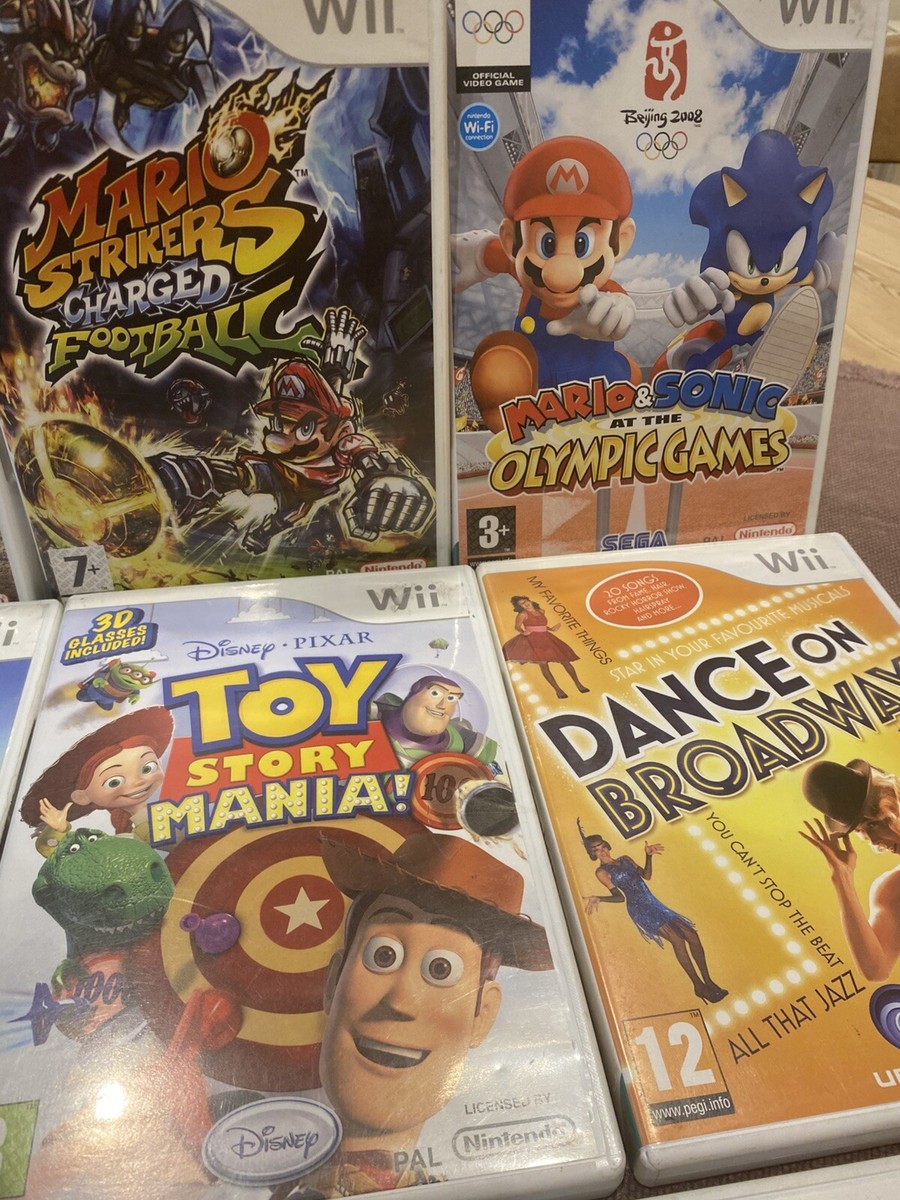 Nintendo Wii Games Bundle x8 Games Pixar Up Mario Strikers