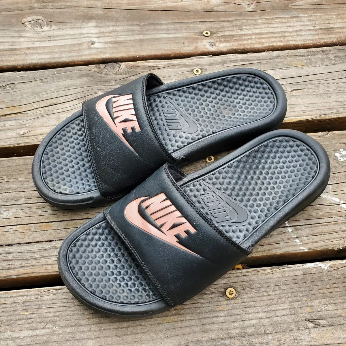 Rose gold and black nike cheap slides