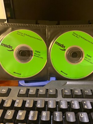 RARE AUTHENTIC BRAND NEW Microsoft Windows XP Multilingual Interface Pack, 2 CDs