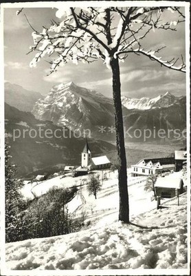 Amden Walensee SG Ortsansicht mit Kirche Blick gegen Glarneralpen