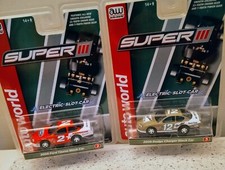 2 Auto World Super III Slot cars, '08 Ford Taurus and '08 Dodge Charger, New