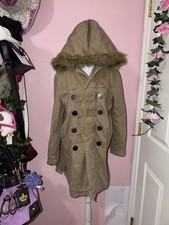 Vintage Brown Trench Coat with fur hood and button detailing, also has a zipper