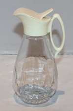 vintage 7 1/4" clear glass syrup dispenser pitcher with plastic top Log Cabin?