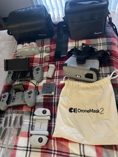 Drone Mask Two Potensic Atom 2 Remotes 4 Smart Battery’s With Charging Station