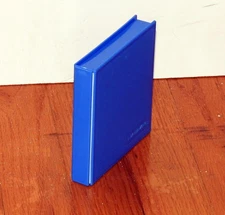 Blue Media Mate 3-1/2-inch floppy disk storage box. Holds 4 diskettes