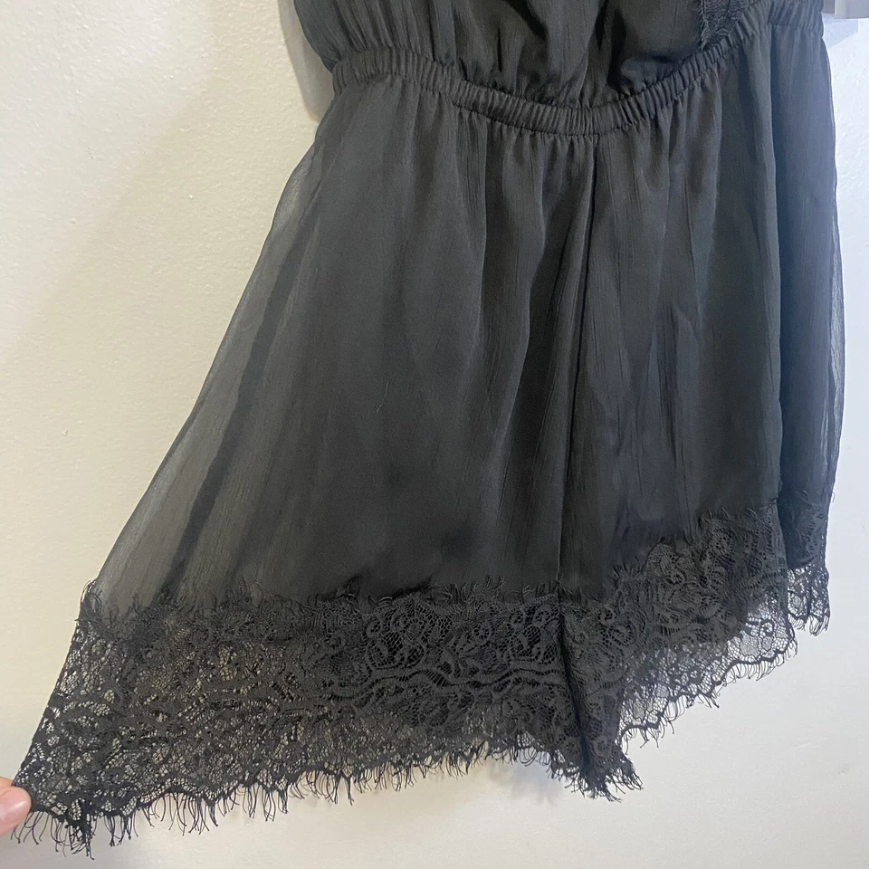 Mameluco Bebe nuevo con etiquetas sin mangas con ribete de encaje talla pequeña negro cintura elástica Foto 4 de 4