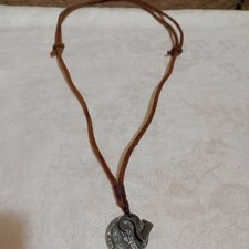 estate necklace. I am not a jeweler. so this is being sold as costume jewelry.