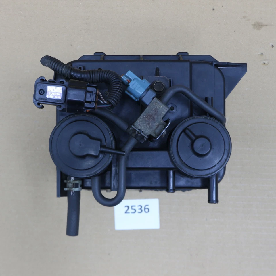 Lexus LX470 Toyota Land Cruiser 98-02 OEM bote de carbón de vapor 77740-60390 Foto 3 de 4