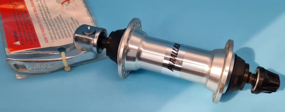 HB-MC12 SHIMANO PARALLAX Mozzo Anteriore Argento 36 Fori Con Quick Release NOS - Immagine 2 di 3