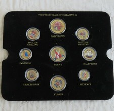 GEORGE VI 9 COIN SET LAYERED IN PURE GOLD AND ACCENTED IN FULL COLOUR