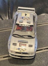 Brand new and in Mint Condition - SCALEXTRIC Silver Subaru Impreza WRC No. 4