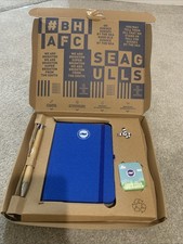 Official Brighton & hove Albion Gift Set - Pen Book Pin badge And Seeds
