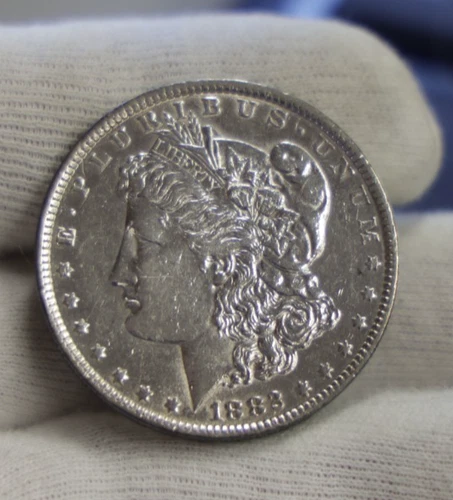 1882 O US Morgan Silver Dollar $1 AU (Harshly Cleaned)