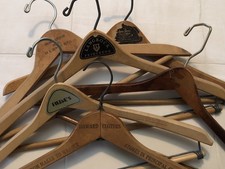 Lot of 6 VTG Wood Advertising Hangers Pierre Cardin Filenes Boston NY Hotel MORE