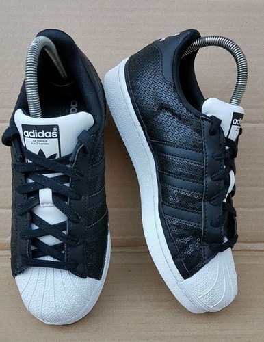 black sequin trainers