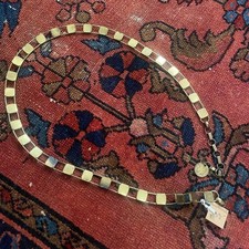 1970s brass toned chain belt with coin at the end