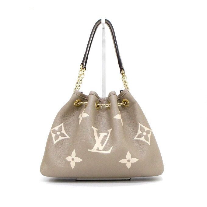 Louis Vuitton Monogram Empreinte Drawstring LV Bu… - image 2