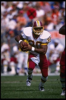 Running back Brian Mitchell Washington Redskins runs downfield aga- 1995 Photo 1