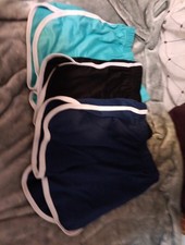 3 Pairs Of Girls Size Small Shorts Lght Blue, Navy, Black