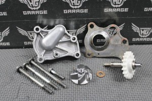 1995 92-96 HONDA CR250R OEM WATER PUMP SHAFT HOUSING COVER IMPELLER ASSY
